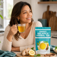 middle aged latin woman drinking sweet balance blood sugar and metabolism support tea at her kitchen table and smiling